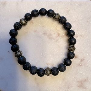 Black lava beads and antique bronze stretch bracelet